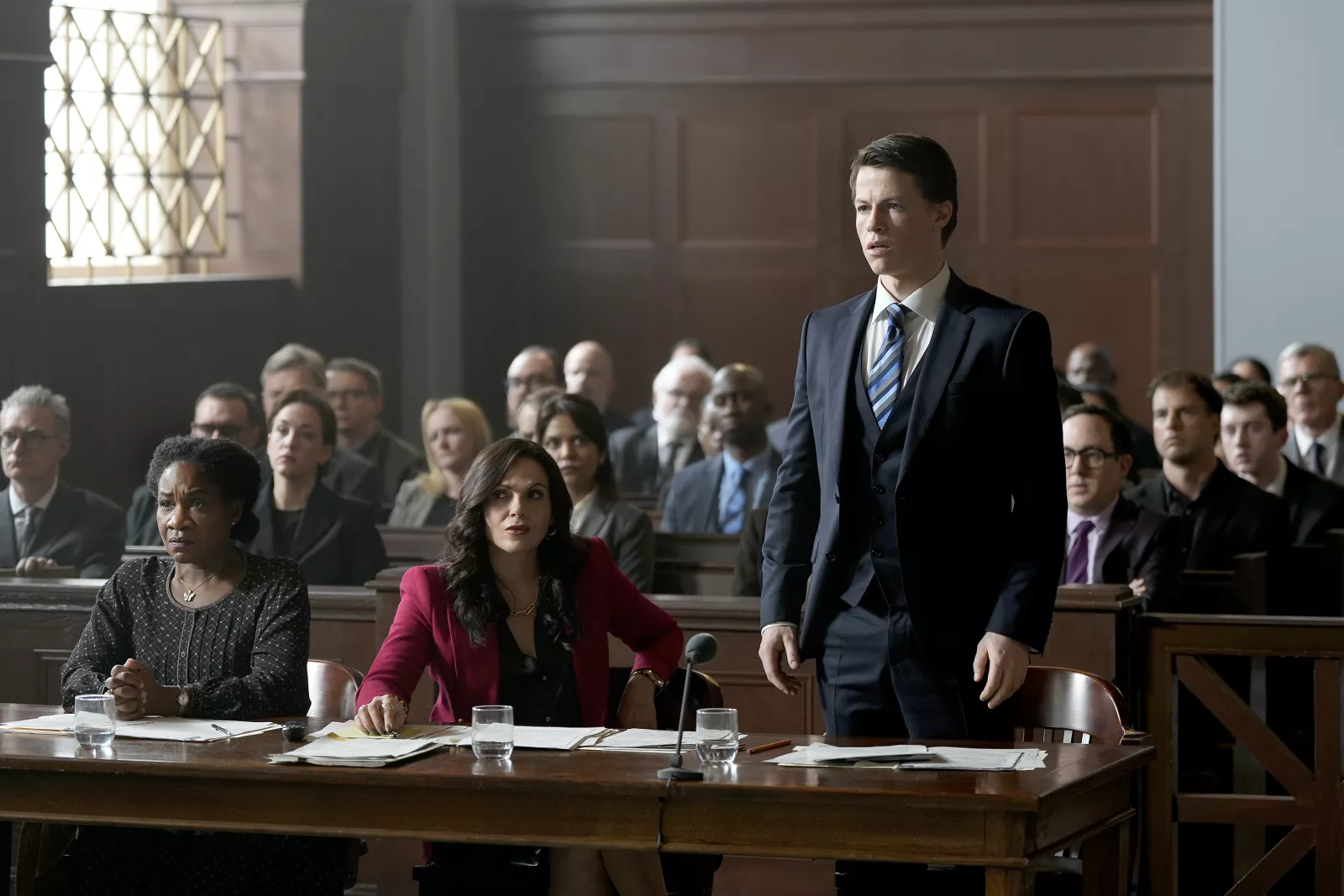 Episode 110 -- (l-r) Karen Bryson as Dot Black, Lana Parrilla as Jocelyn "Bruiser" Stone, Milo Callaghan as Rudy Baylor in The Rainmaker. Photo Credit: Christopher Barr/USA Network © 2025 VERSANT MEDIA. All Rights Reserved 