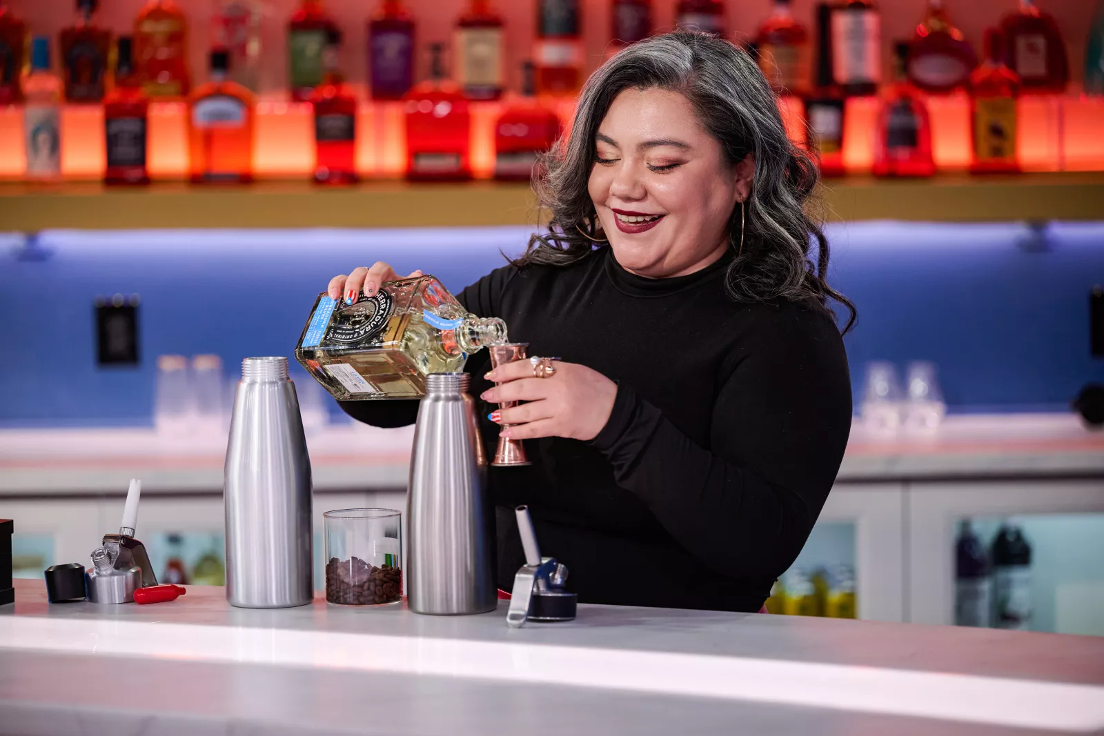 Genesis Cruz on Cocktail Wars on E! Photo Credit: Scott Gries/E! Entertainment © 2026 VERSANT MEDIA. All Rights Reserved.