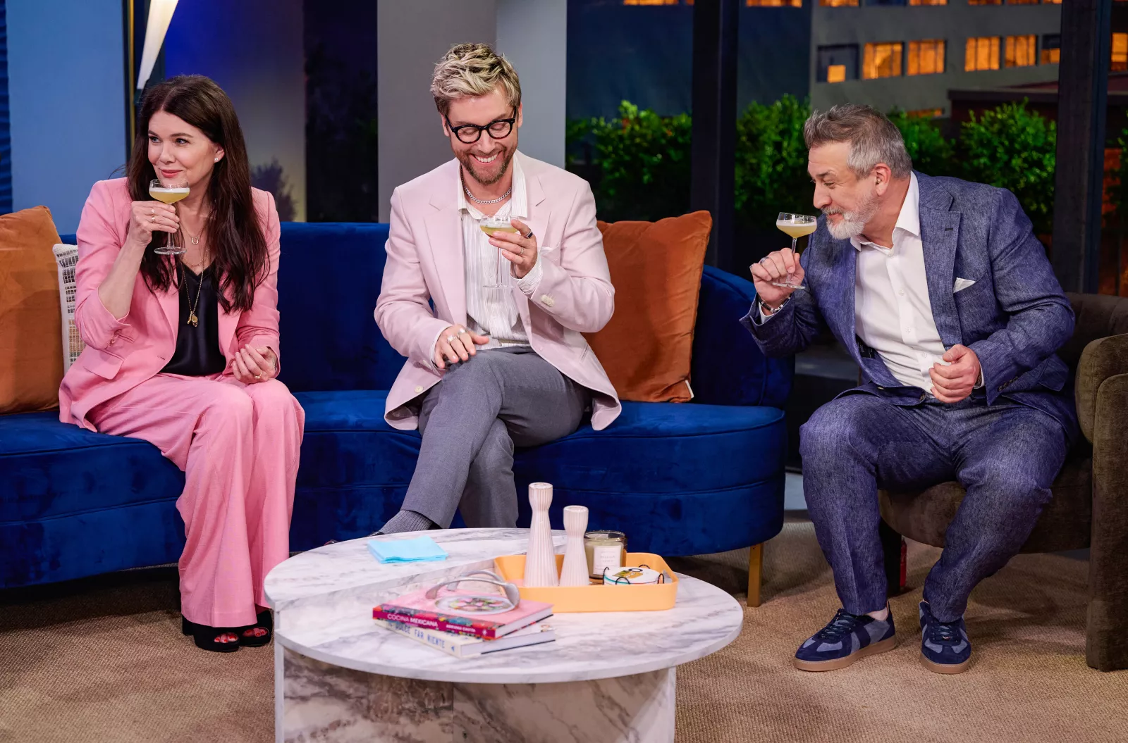 (L-R) Lauren Graham, Lance Bass and Joey Fatone on Cocktail Wars on E! Photo Credit: Scott Gries/E! Entertainment © 2026 VERSANT MEDIA. All Rights Reserved.
