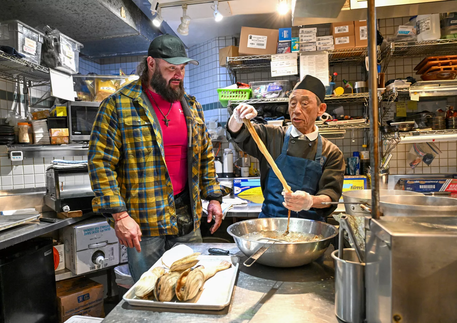 Braun Strowman visits Houston in Everything On The Menu with Braun Strowman on USA Network. Photo credit: Amy Mikler/USA Network © 2026 VERSANT MEDIA. All Rights Reserved.