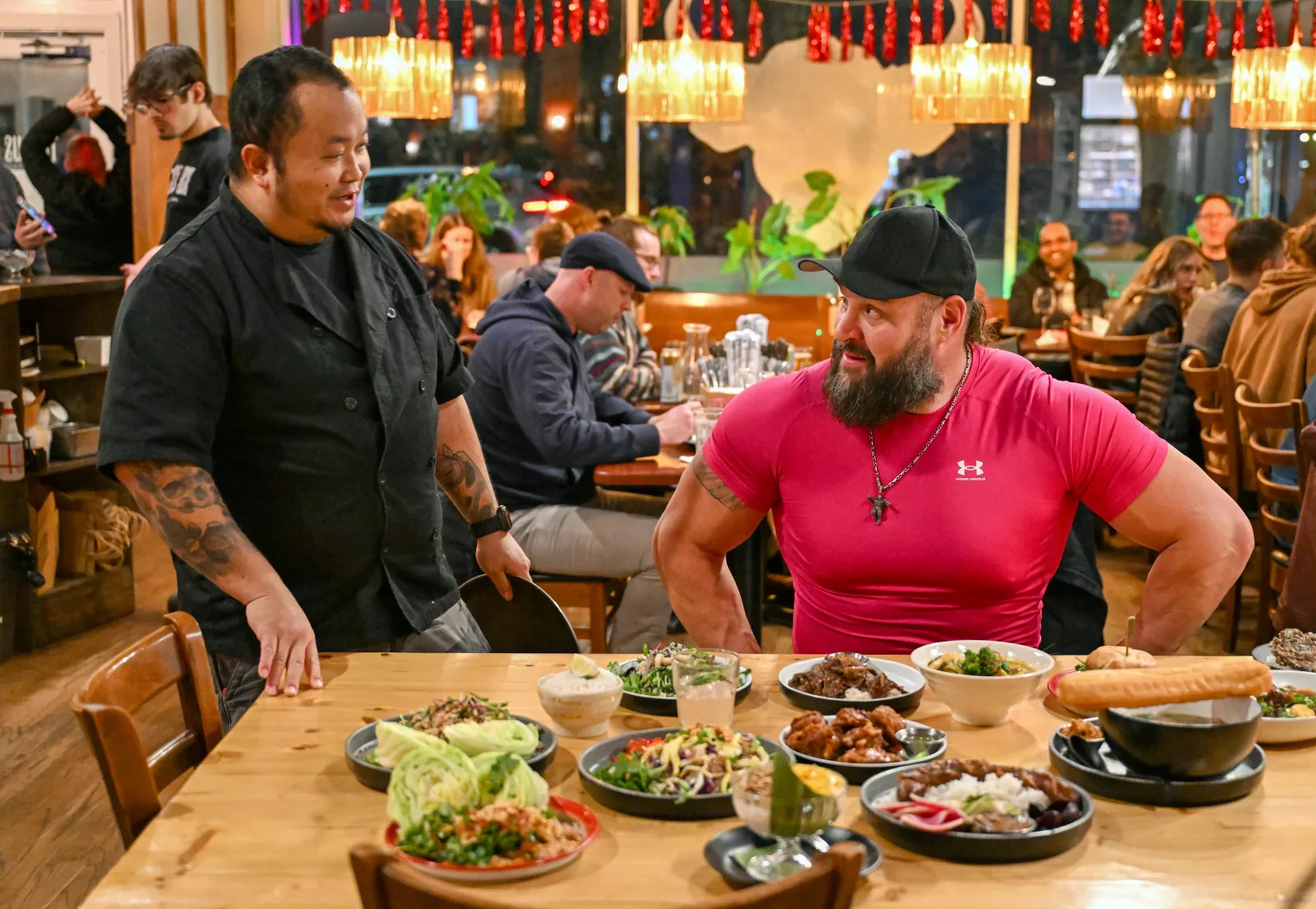 Braun Strowman visits Houston in Everything On The Menu with Braun Strowman on USA Network. Photo credit: Amy Mikler/USA Network © 2026 VERSANT MEDIA. All Rights Reserved.