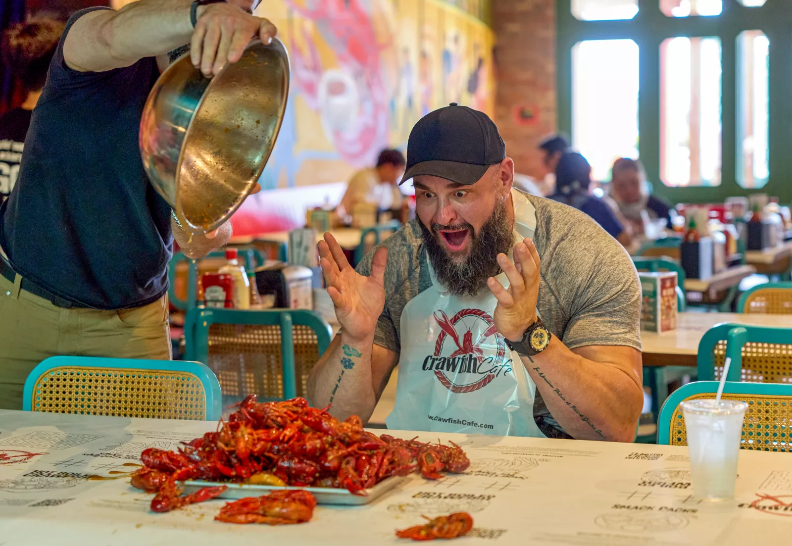 Braun Strowman visits Houston in Everything On The Menu with Braun Strowman on USA Network. Photo credit: Amy Mikler/USA Network © 2026 VERSANT MEDIA. All Rights Reserved.